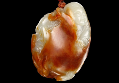 来看看怎么鉴别和田玉籽料与染色青海料